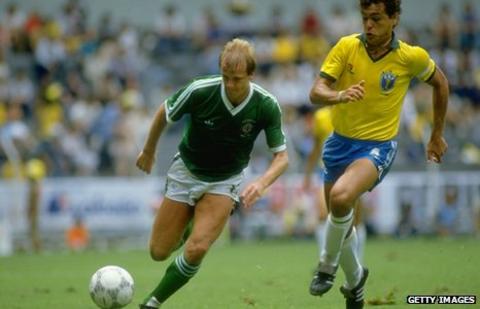Colin Clarke battles with Brazil's Edhino during the 1986 World Cup finals