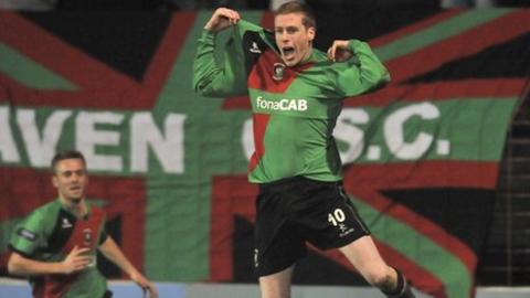 Darren Boyce leaps for joy after scoring the only goal at the Oval