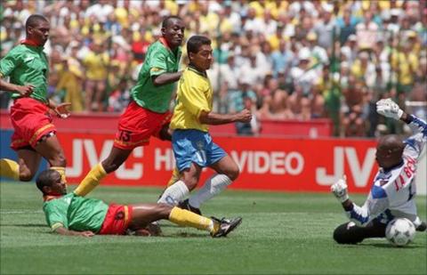 Romario (in yellow) scores against Cameroon in Brazil's 3-0 group win at the 1994 World Cup in the United States