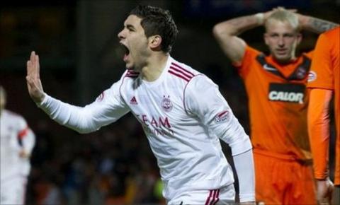 Mohamed Chalali celebrates