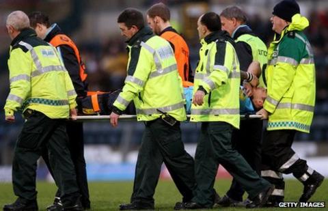 Worcester's Ezra Taylor is carried off