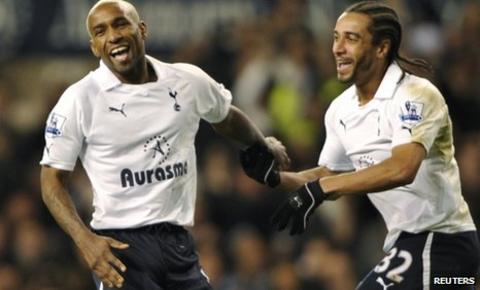 Jermain Defoe (left) celebrates his goal with Benoit Assou-Ekotto