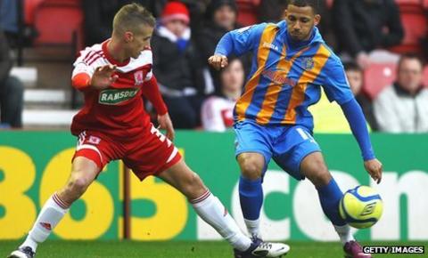 Lionel Ainsworth of Shrewsbury and Joe Bennett of Middlesbrough