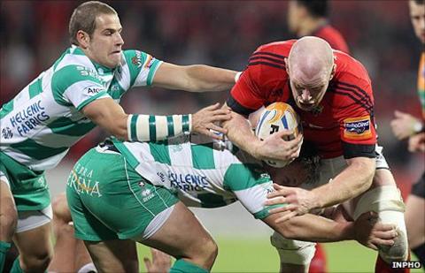 Franco Sbaraglini and Tobias Botes of Treviso combine in an attempt to stop Munster's Paul O'Connell
