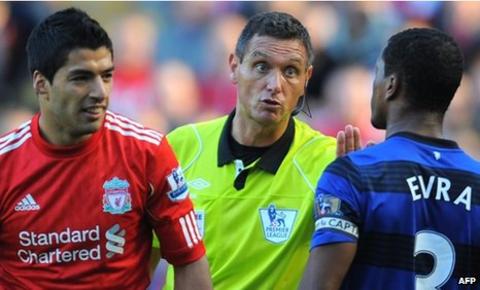 Liverpool's Luis Suarez and Manchester United's Patrice Evra on 15 October