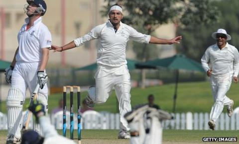 Afghanistan paceman Hamid Hassan celebrates after having Jonathan Trott (left0 caught behind