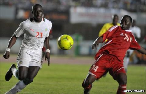 Senegal's Mohamed Diane (left)