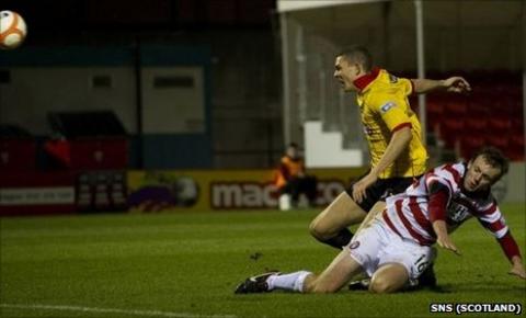 Greig Spence scores