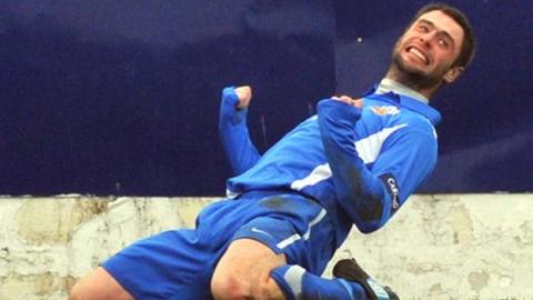 Glenavon player/manager Gary Hamilton celebrates after scoring in the win over Portadown