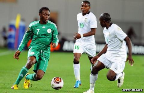 Felix Katongo (C) playing for Zambia against Chinedu Obasi of Nigeria (L) at the 2010 Nations Cup in Angola