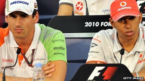 Adrian Sutil and Lewis Hamilton