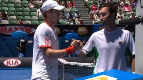 Andy Murray shakes hands with Mikhail Kukushkin