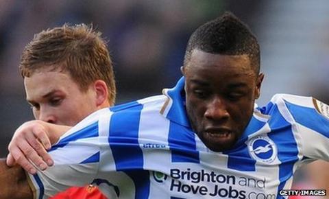 Kazenga LuaLua (r) battles Wrexham's Jay Harris