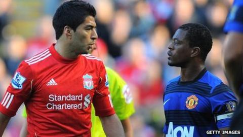 Luis Suarez and Patrice Evra