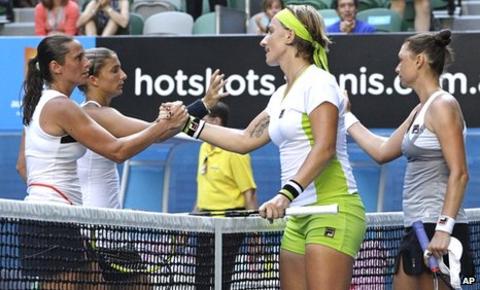 Sara Errani and Roberta Vinci congratulate Svetlana Kuznetsova and Vera Zvonareva