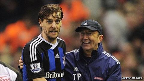 Stoke City's Jonathan Woodgate (left) is congratulated by manager Tony Pulis after a 0-0 draw at Liverpool