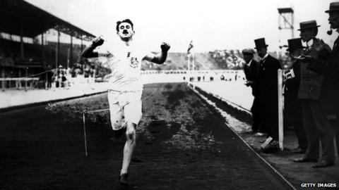 British athlete Wyndham Halswelle crosses the finishing line of the re-run Olympic 400m in 1908