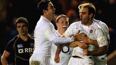 Charlie Hodgson celebrates after scoring England's try