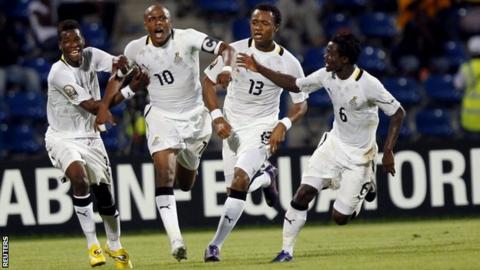 Ghana players celebrate their winner in extra-time against Tunisia