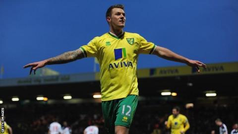 Norwich City winger Anthony Pilkington celebrates scoring at Carrow Road
