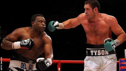 Tyson Fury, right, against Dereck Chisora