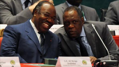 President of Gabon, Ali Bongo, and Issa Hayatou, Confederation of African Football president (right)