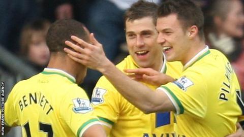 Norwich's Anthony Pilkington (right) celebrates with Grant Holt and Elliott Bennett after scoring their second goal