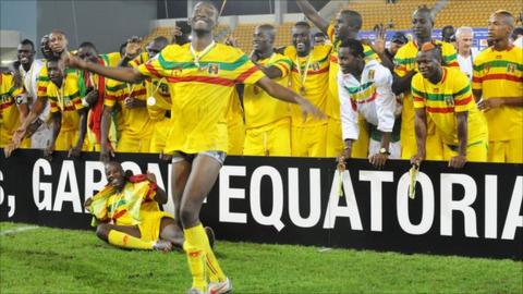 Malians celebrate their third-place play-off win against Ghana on Saturday