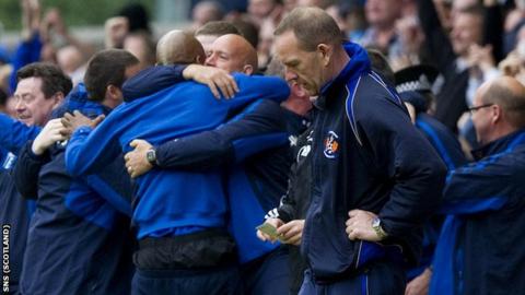 Rangers coaching staff celebrate their title-winning triumph at Rugby Park last season