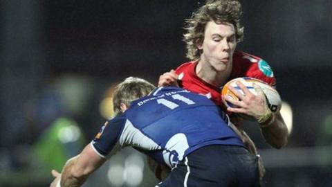 Leinster's Fionn Carr tackles Liam Williams in the RDS encounter