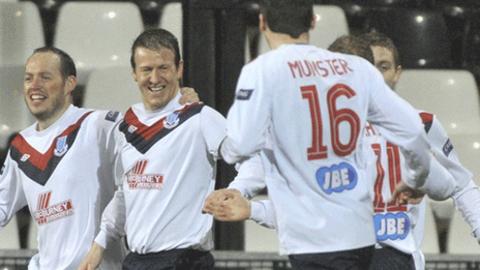 Allan Jenkins (second from left) celebrates after putting Ballymena ahead