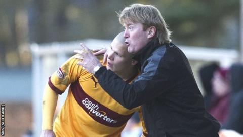 Motherwell manager Stuart McCall with Henrik Ojamaa