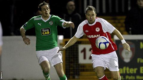 Cliftonville's Eamonn Seydak in action against Sean O'Connor of St Pat's Athletic