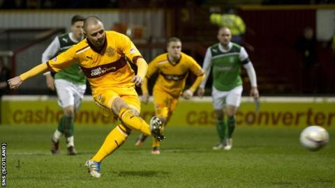 Michael Higdon scores a penalty for Motherwell against Hibernian