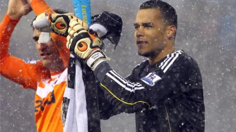 Michel Vorm with Danny Graham