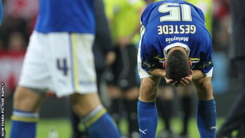 Rudy Gestede shows his disappointment after Cardiff's defeat