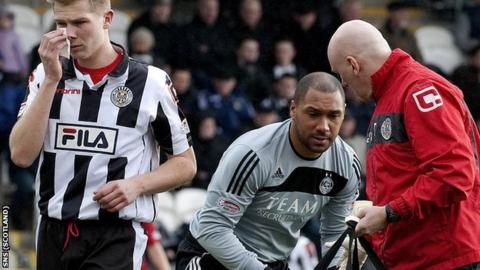 McAusland (left) was substituted before half-time after suffering his head knock