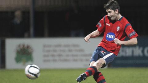 Curtis Allen slots home his penalty to win the game for Coleraine