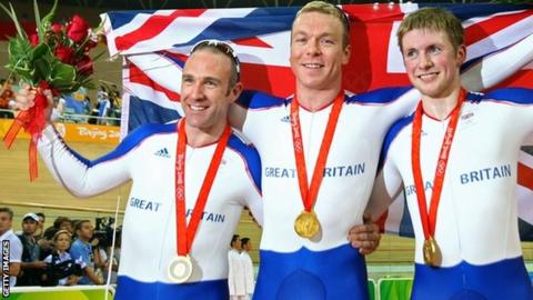 (Left to Right) Jamie Staff, Chris Hoy, and Jason Kenny of Great Britain celebrate after taking gold in the Men's Team Sprint Final at the Laoshan Velodrome at the Beijing 2008 Olympics