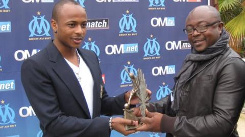 Dede Ayew with the BBC African Footballer of the Year tropy that he collected from his father Abedi