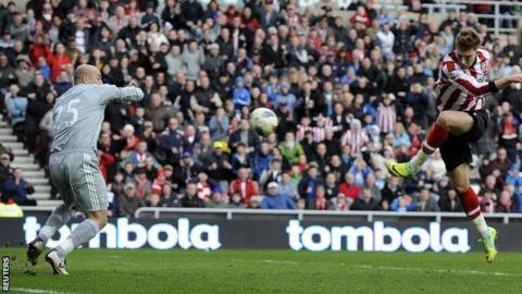 Nicklas Bendtner scores against Liverpool