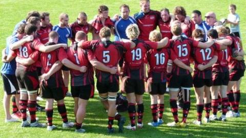 Jersey team huddle