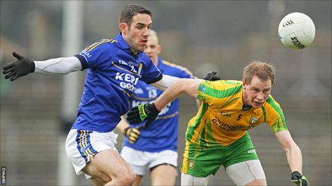Kerry's Declan O'Sullivan in action against Anthony Thompson of Donegal