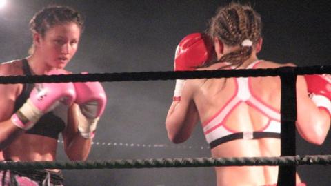 Julie Kitchen (left) defends her title