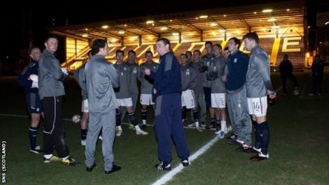 Dundee manager Barry Smith had to tell his players the game was off