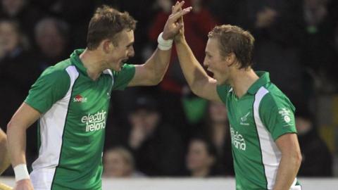 David Ames (left) celebrates his goal with Michael Watt