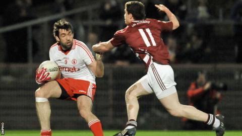 Joe McMahon battles with Ger Egan in Saturday's win over Westmeath