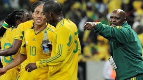South Africa coach Pitso Mosimane (in green) directs his players