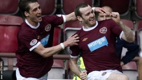 Beattie (right) celebrates his goal in the 2-0 win over Hibernian