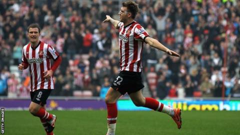 Nicklas Bendtner celebrates his goal